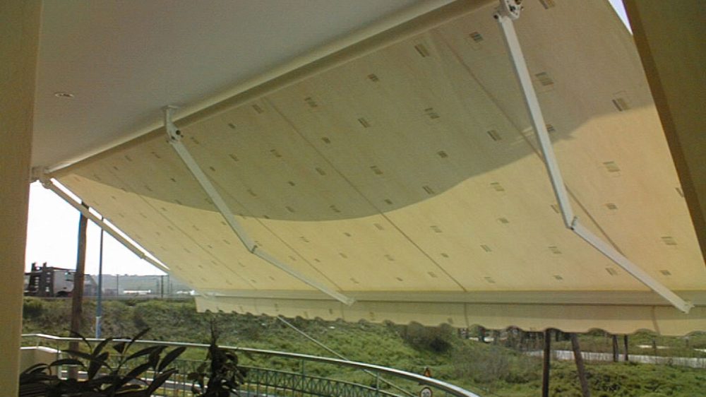 FOLDING-ARM AWNING