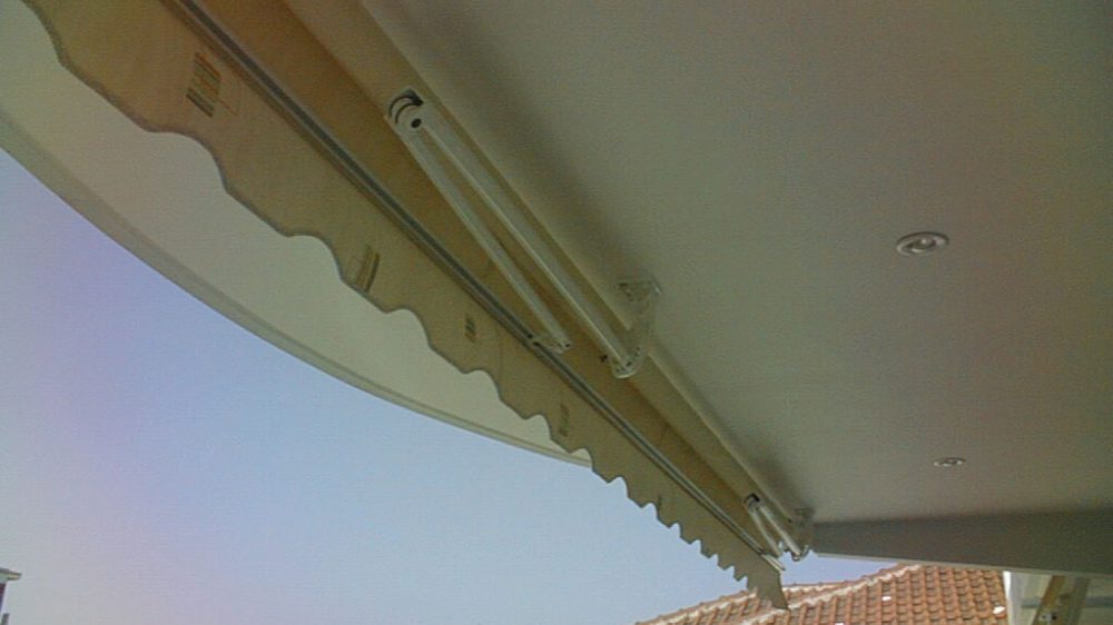 FOLDING-ARM AWNING