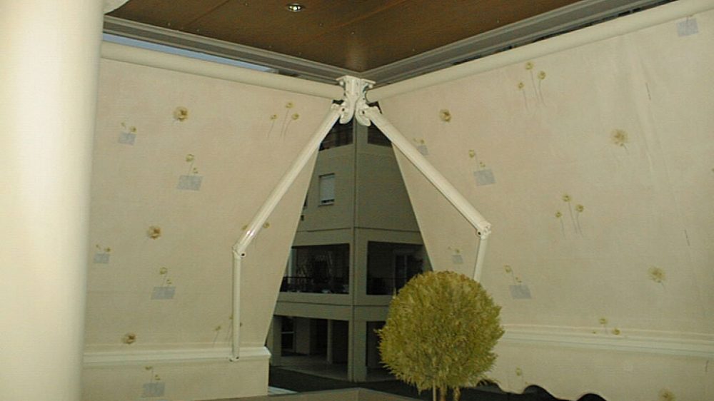 FOLDING-ARM AWNING