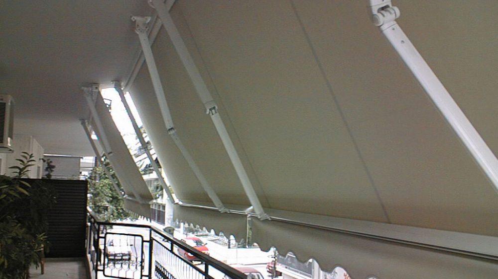 FOLDING-ARM AWNING