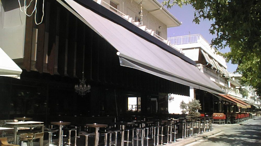 FOLDING-ARM AWNING