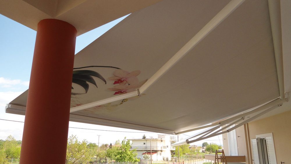 FOLDING-ARM AWNING