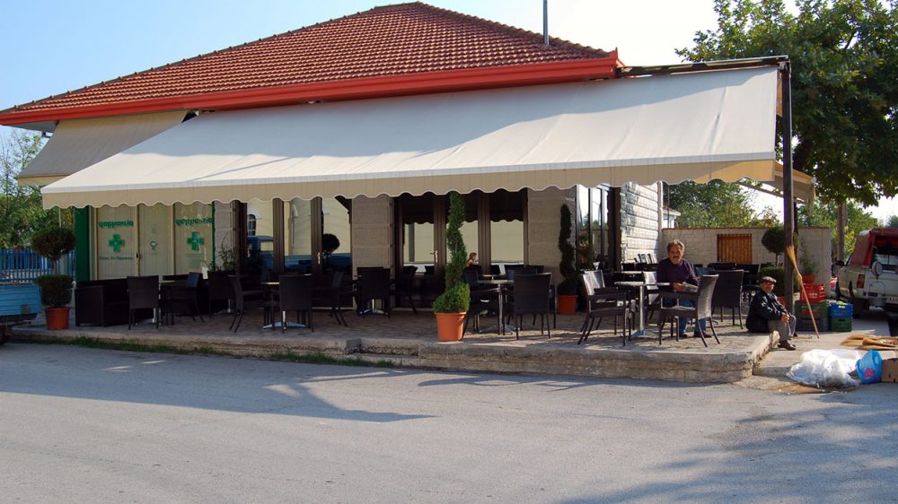 FOLDING-ARM AWNING