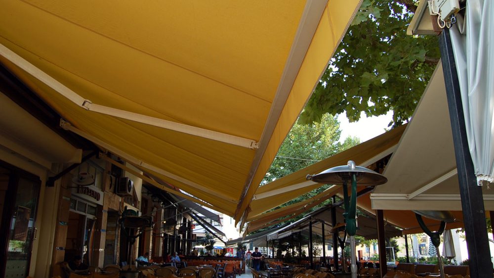 FOLDING-ARM AWNING