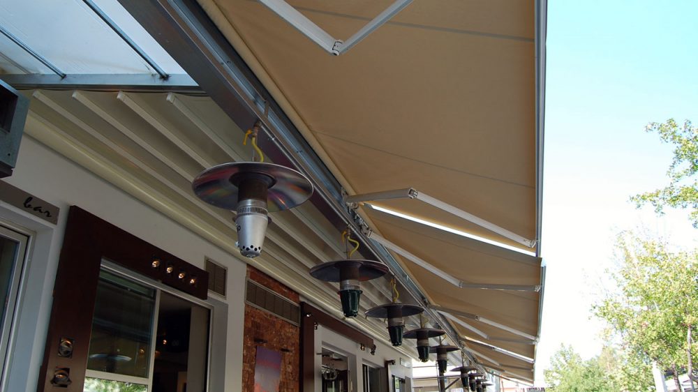 FOLDING-ARM AWNING