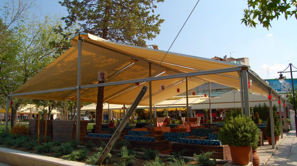 FOLDING-ARM AWNING